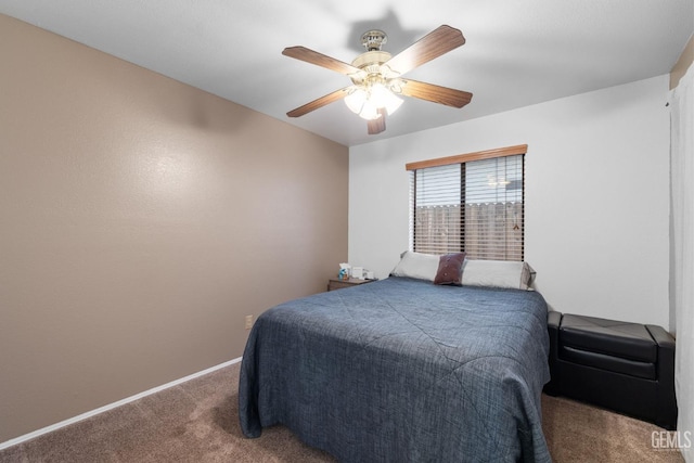 bedroom with carpet, baseboards, and ceiling fan