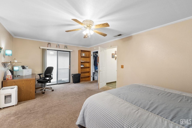 bedroom featuring ceiling fan, carpet, visible vents, and crown molding