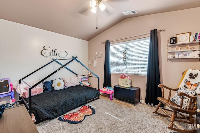 bedroom featuring vaulted ceiling, carpet floors, and ceiling fan