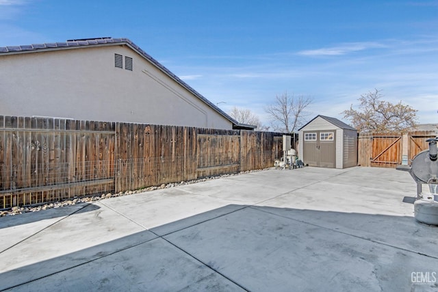 view of patio with a shed