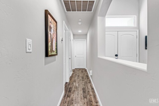 hallway featuring hardwood / wood-style flooring