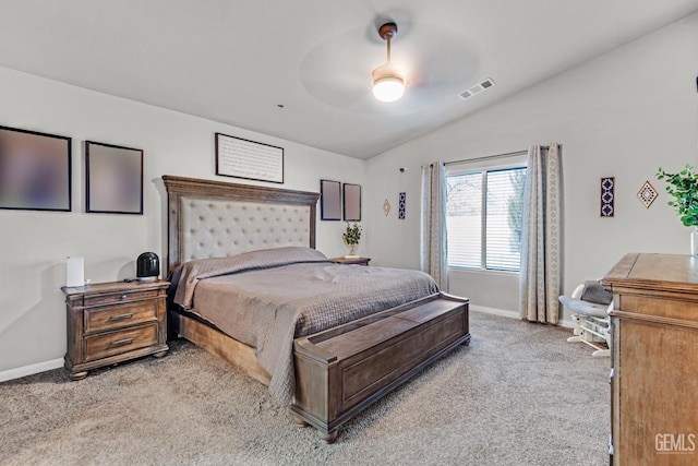 carpeted bedroom featuring vaulted ceiling and ceiling fan