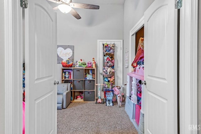 playroom featuring carpet flooring and ceiling fan