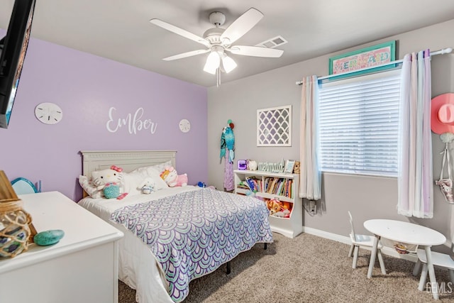 bedroom featuring light carpet and ceiling fan