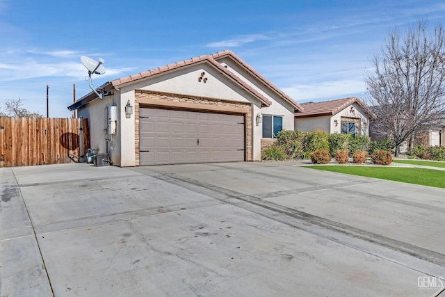 single story home featuring a garage