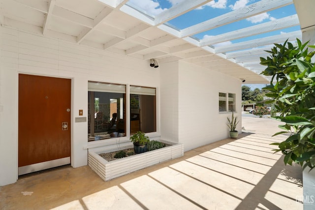 2421 C St, Bakersfield, CA 93301 - property entrance with a security system and a patio
