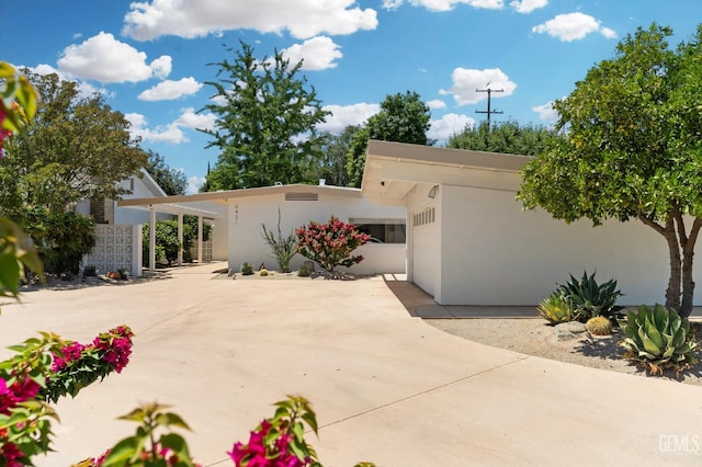 2421 C St, Bakersfield, CA 93301 - view of front of property with driveway and stucco siding