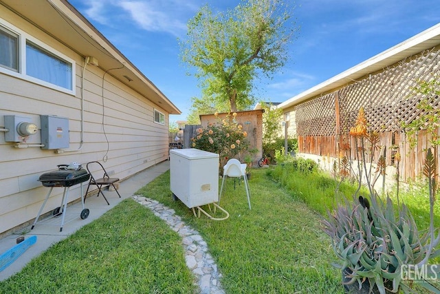 view of yard with fence