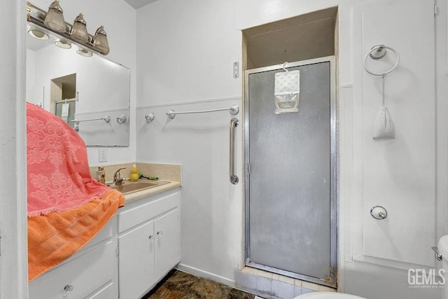 full bath featuring a shower stall and vanity