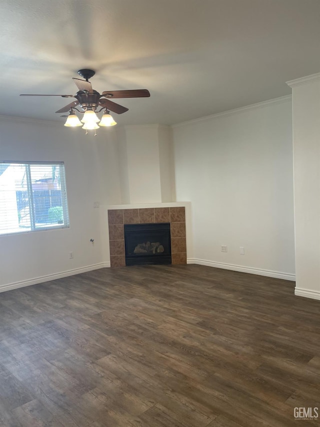 10931 Vista Del Valle Dr, Bakersfield, CA 93311 - unfurnished living room with crown molding, dark wood finished floors, a tile fireplace, and a ceiling fan