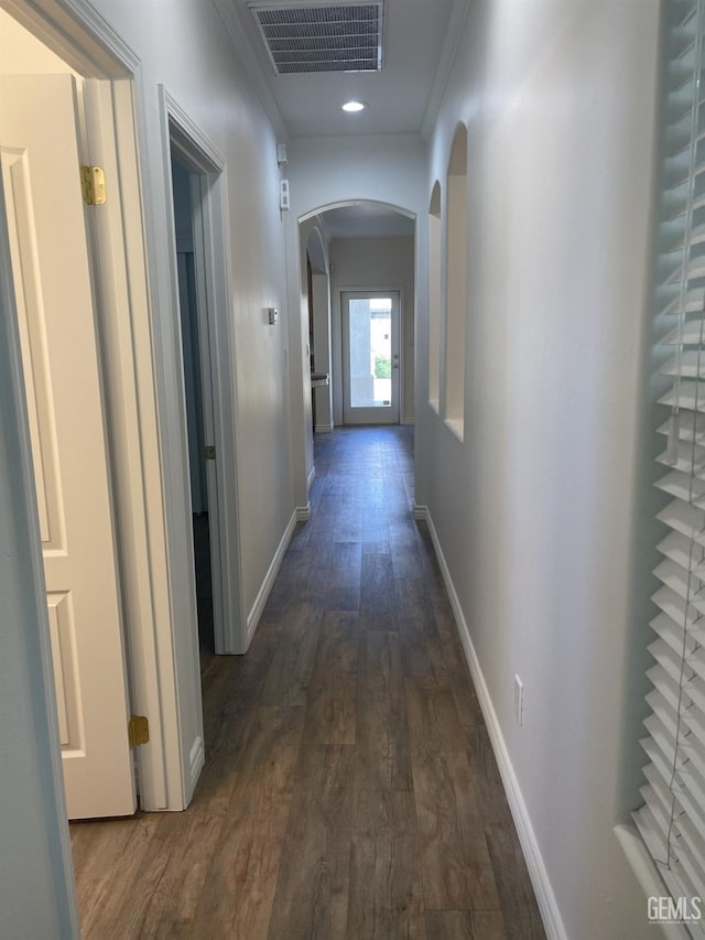 10931 Vista Del Valle Dr, Bakersfield, CA 93311 - hall with arched walkways, dark wood-type flooring, ornamental molding, and recessed lighting