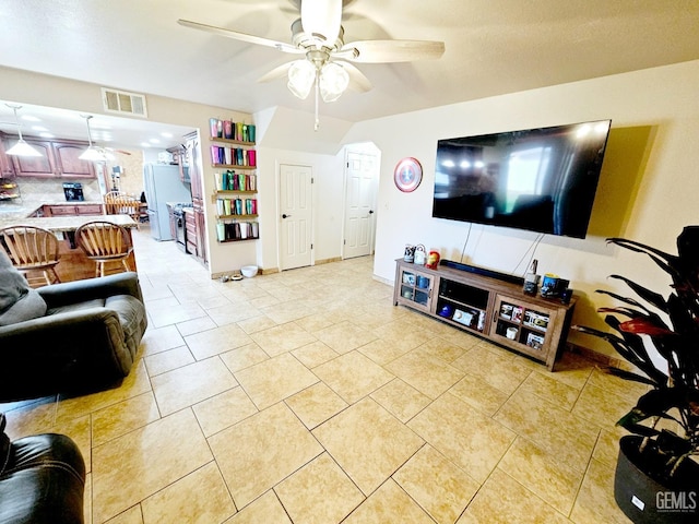 living room with ceiling fan