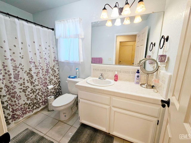 bathroom with decorative backsplash, tile patterned flooring, vanity, toilet, and a shower with curtain