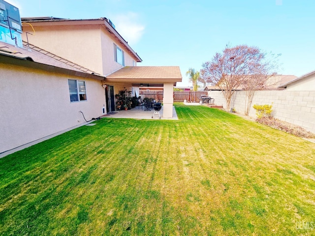 view of yard with a patio area