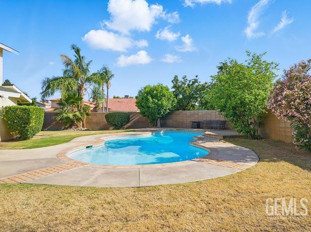 3717 Alcott Dr, Bakersfield, CA 93311 - view of swimming pool featuring a patio area