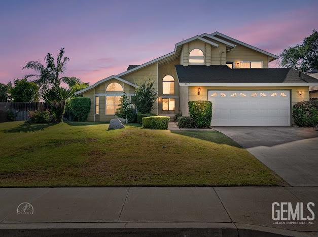 3717 Alcott Dr, Bakersfield, CA 93311 - view of front of home with driveway and an attached garage