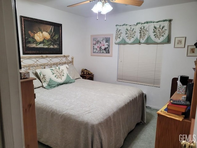 carpeted bedroom with a ceiling fan