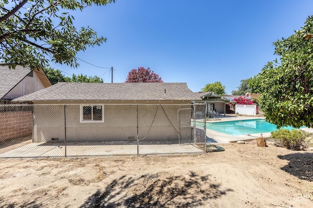 1830 Chevy Chase Way, Bakersfield, CA 93306 - rear view of house featuring a patio and a shingled roof