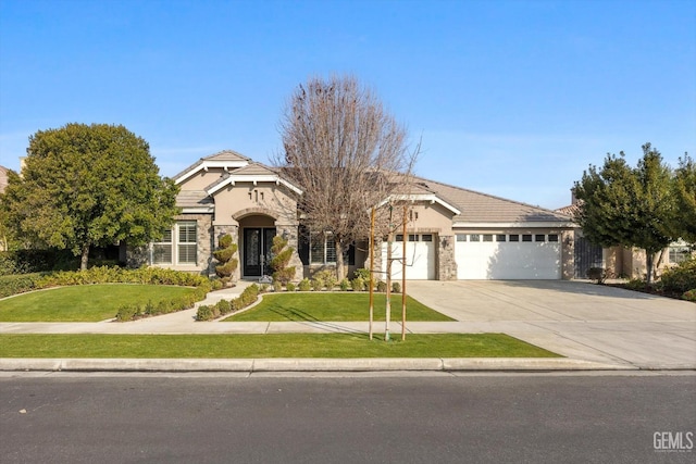 view of front of property with stone siding, an attached garage, driveway, and a front lawn