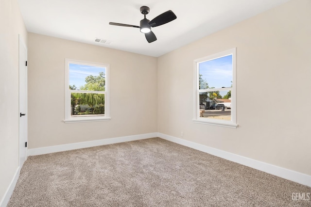 702 Wilson Ave, Bakersfield, CA 93308 - unfurnished room featuring carpet floors and a ceiling fan