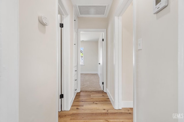 702 Wilson Ave, Bakersfield, CA 93308 - hallway with light wood-style floors and baseboards