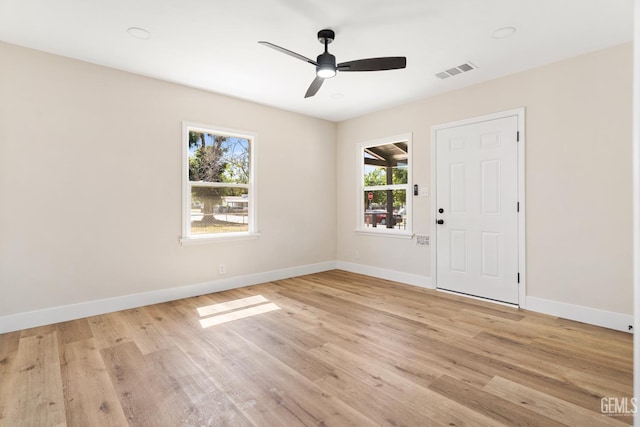 702 Wilson Ave, Bakersfield, CA 93308 - spare room with plenty of natural light, light wood-style floors, and a ceiling fan