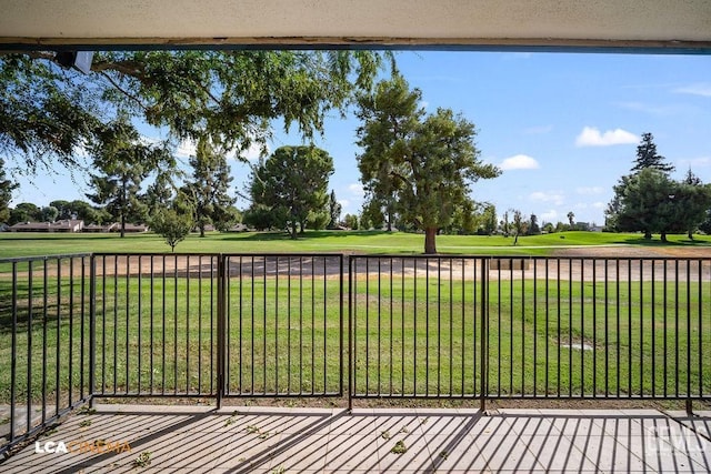 deck featuring a lawn