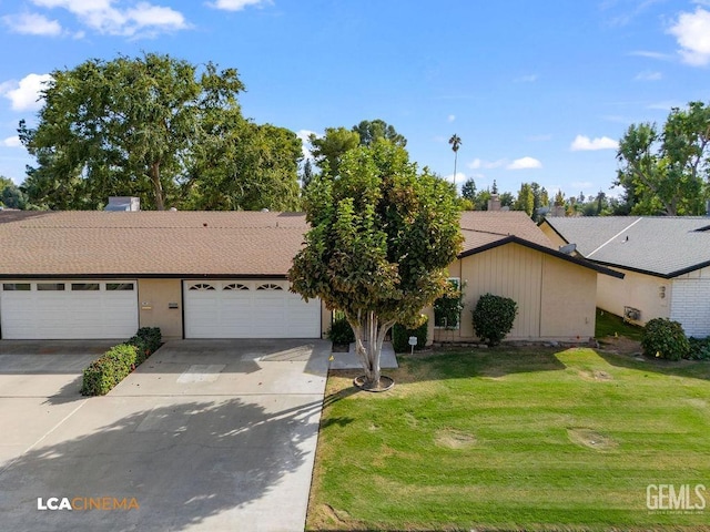 single story home featuring a garage and a front yard