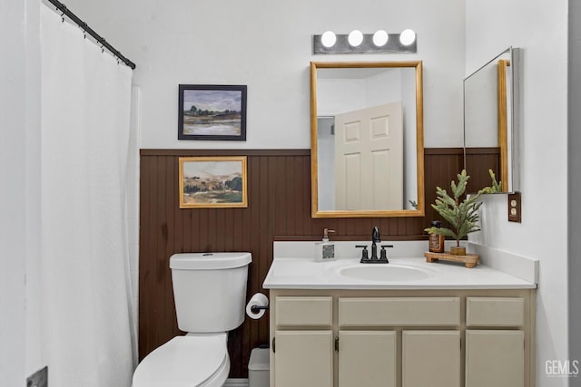 5928 Dyce Way, Bakersfield, CA 93306 - bathroom with wainscoting, vanity, a shower with shower curtain, and wooden walls