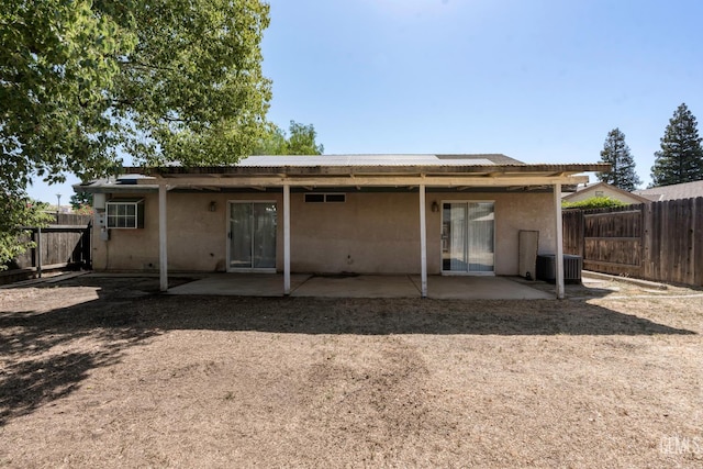 5928 Dyce Way, Bakersfield, CA 93306 - back of property featuring a fenced backyard and a patio