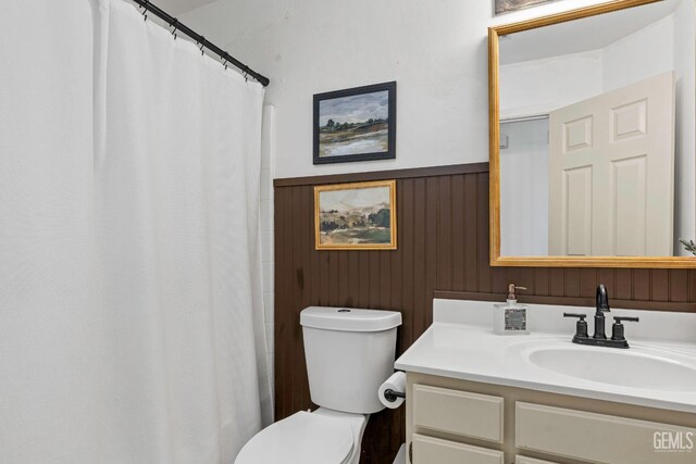 5928 Dyce Way, Bakersfield, CA 93306 - bathroom with vanity, a wainscoted wall, and a shower with curtain