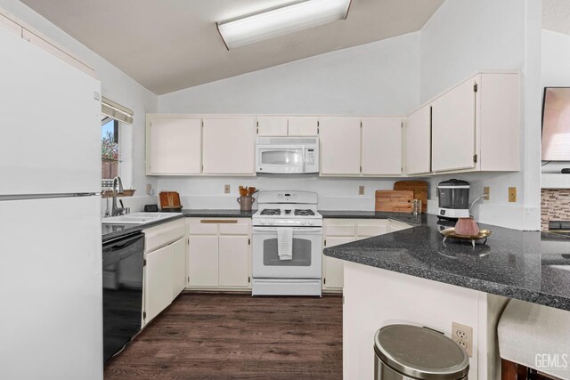 5928 Dyce Way, Bakersfield, CA 93306 - kitchen featuring white appliances, vaulted ceiling, dark wood finished floors, a peninsula, and white cabinets