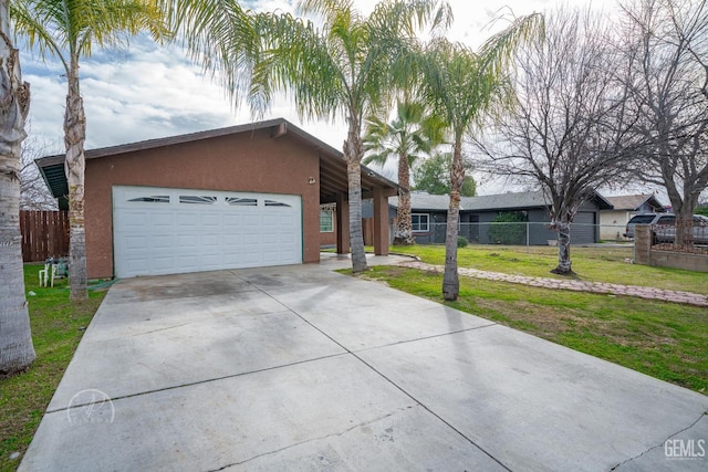 ranch-style home featuring a garage and a front lawn