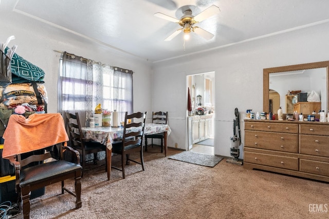 dining room featuring carpet and ceiling fan