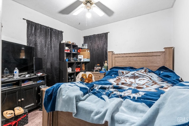 carpeted bedroom featuring a ceiling fan