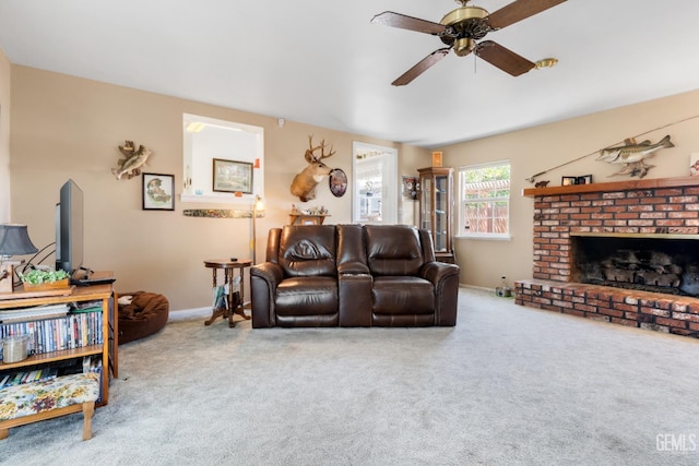 318 Cypress St, Bakersfield, CA 93304 - living area featuring ceiling fan, carpet, and a brick fireplace
