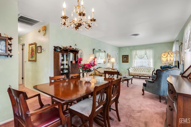 318 Cypress St, Bakersfield, CA 93304 - dining room featuring carpet floors and a chandelier