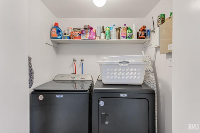 laundry room featuring washer and clothes dryer