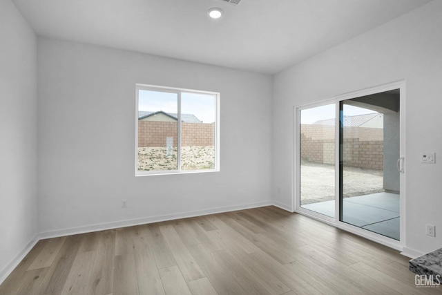 5016 Beaverhead Ave, Bakersfield, CA 93306 - spare room with wood finished floors and recessed lighting