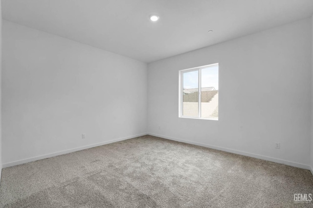 5016 Beaverhead Ave, Bakersfield, CA 93306 - carpeted spare room with baseboards and recessed lighting