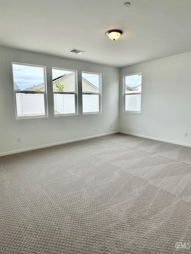 empty room with carpet floors