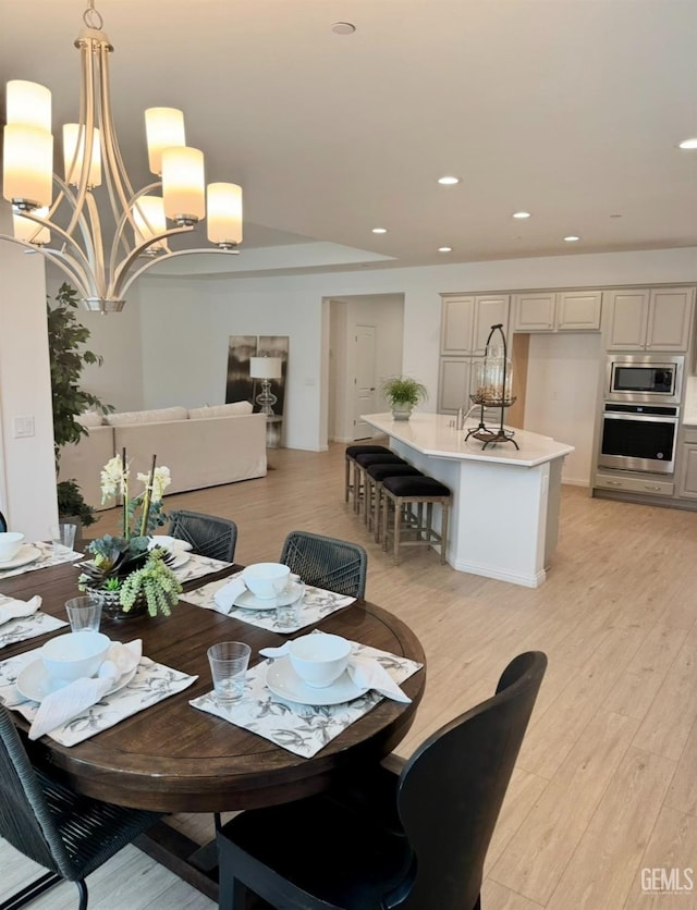 dining space featuring light hardwood / wood-style flooring