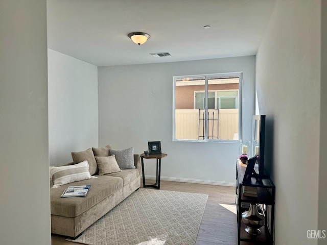 living room with hardwood / wood-style flooring