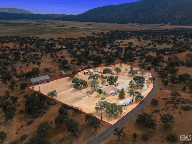 aerial view featuring a rural view and a mountain view