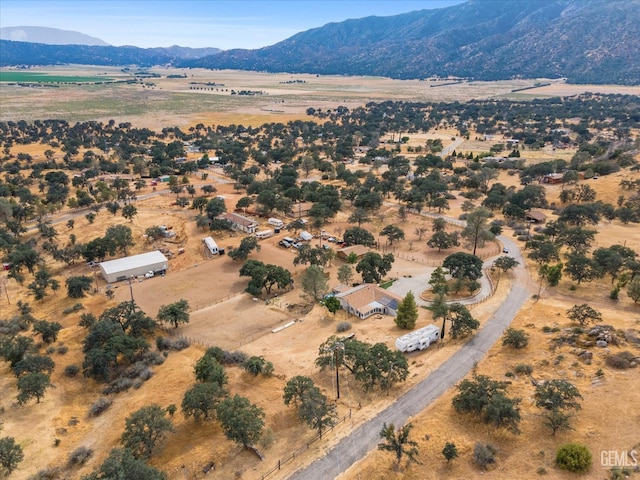 aerial view featuring a rural view and a mountain view