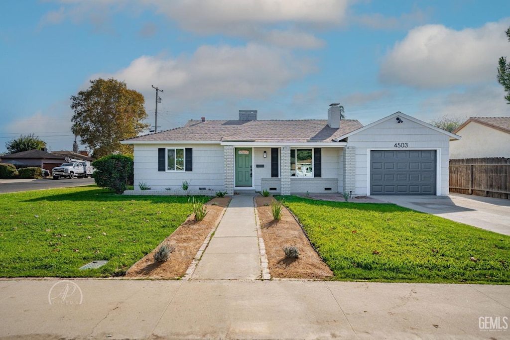 ranch-style house with an attached garage, fence, driveway, a chimney, and a front yard