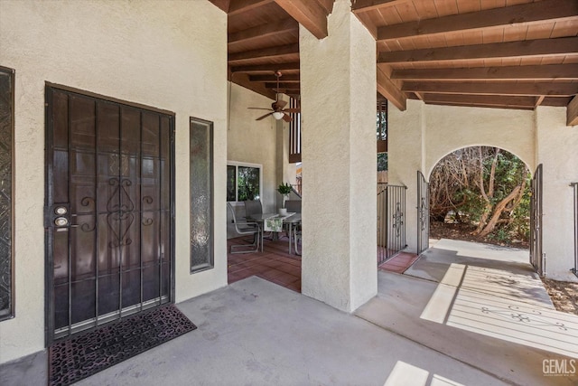 4512 Orrick Ct, Bakersfield, CA 93308 - doorway to property with stucco siding, ceiling fan, and outdoor dining area