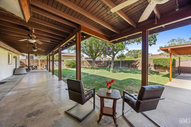 4512 Orrick Ct, Bakersfield, CA 93308 - fenced backyard with ceiling fan and a patio