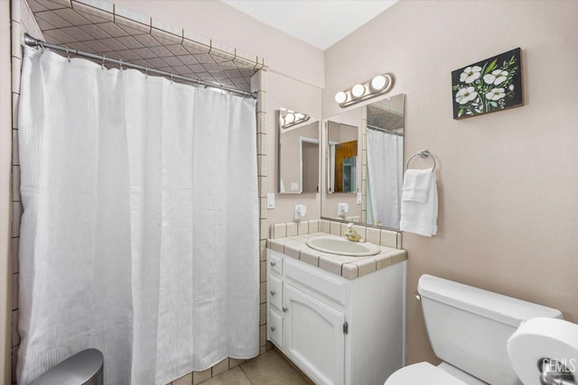 4512 Orrick Ct, Bakersfield, CA 93308 - full bathroom featuring vanity, tile patterned flooring, and a shower with curtain