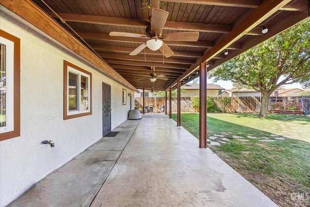 4512 Orrick Ct, Bakersfield, CA 93308 - fenced backyard with a ceiling fan and a patio area